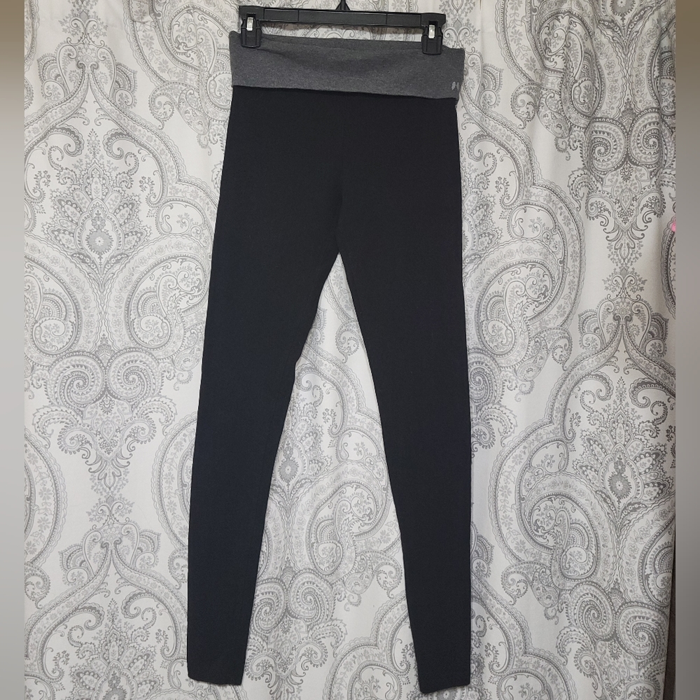 Victoria's Secret folder over leggings